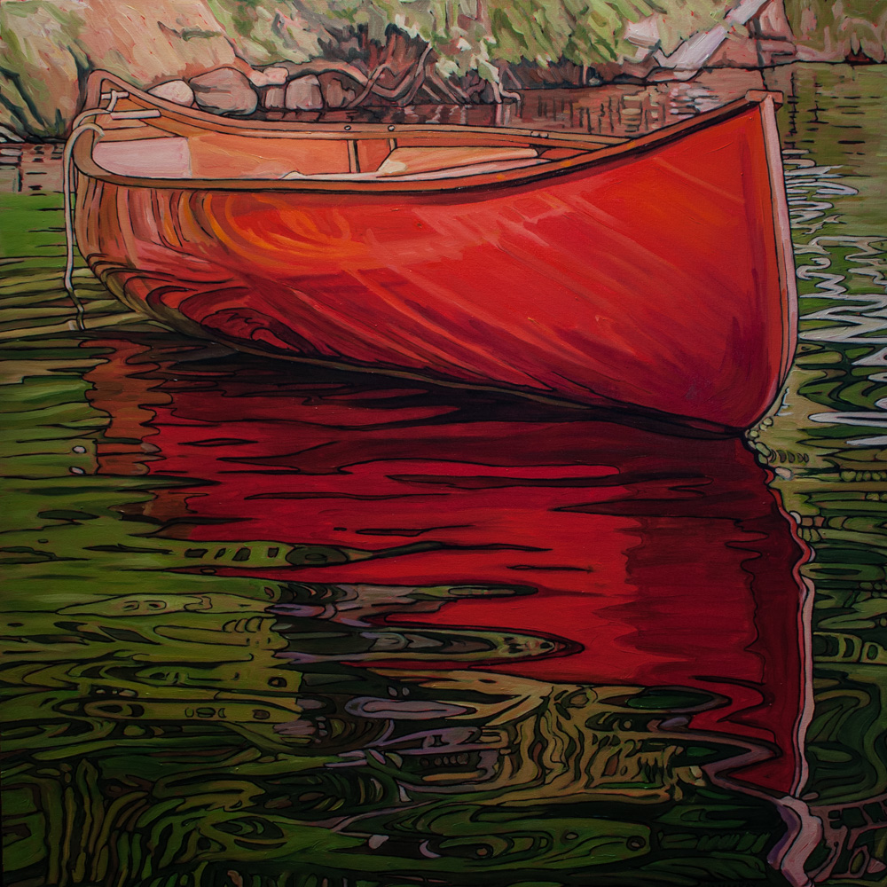 Red canoe and reflection